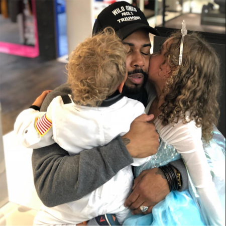 Omari Hardwick with his son and daughter.