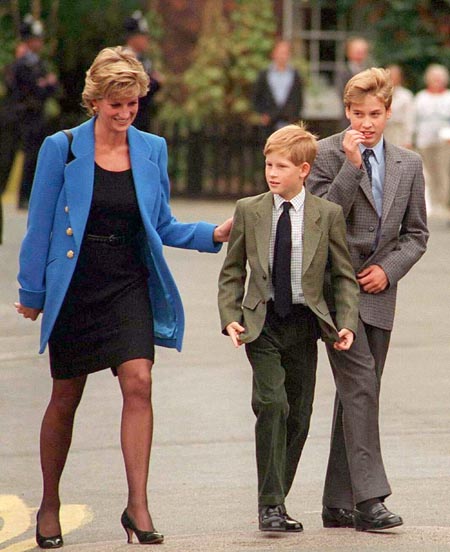 Young Prince Harry and Phillip with their mother.