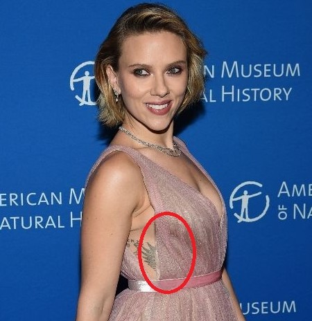 Angel's wing on Scarlett Johansson's right rib.