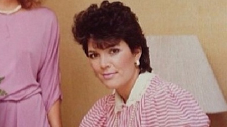 Kris Jenner with a perm in an early photo.