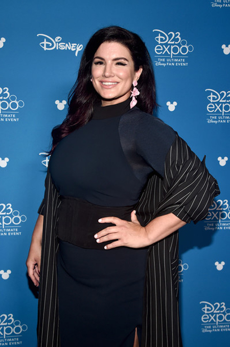 Gina Carano at the D23 Expo wearing a black dress