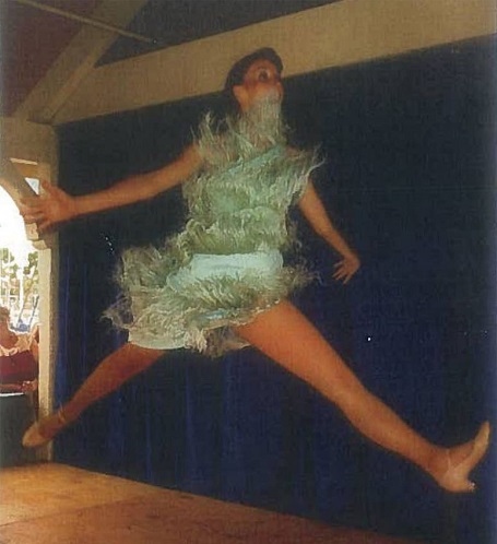 Phyllis Smith doing a jump split while dancing with a small revue at Shoreline Village in Long Beach, CA.