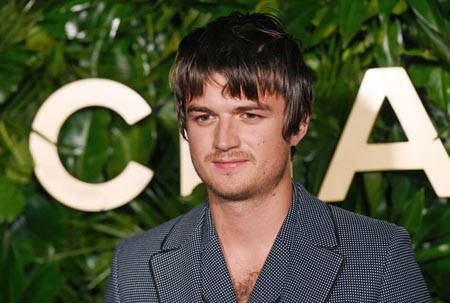 Joe Keery at the Chanel party with his new bangs