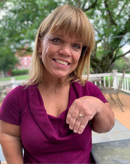 Amy Roloff showing off her heart-shaped diamond ring.