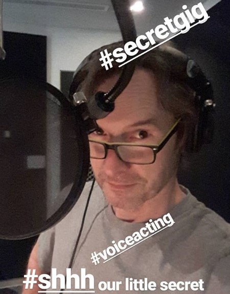 Adrian in on of his jobs, where he is voice acting for a secret project (as he said it).