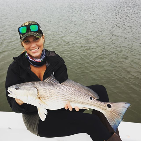 Rhylee Gerber holding a fish