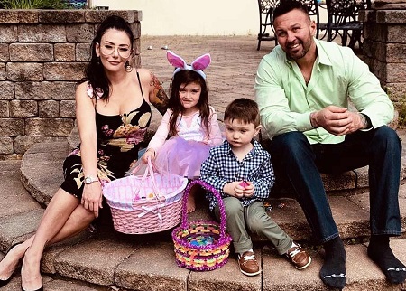 Jenni Farley and Roger Mathews with their kids during Easter 2019 in his house.