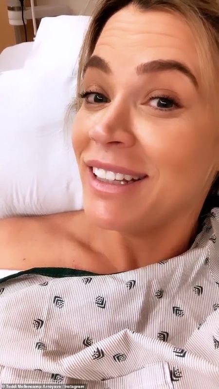 Teddi in the hospital while giving birth