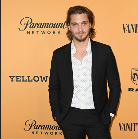 Luke Grimes in premiere party of Yellowstone series.