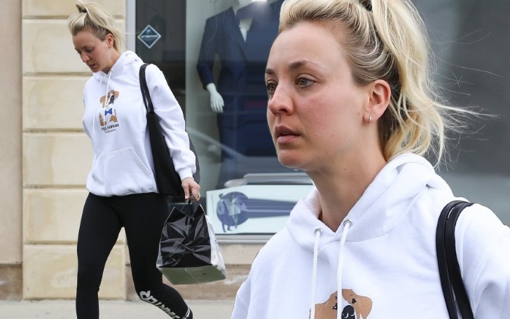 Kaley Cuoco Steps Out In Hoodie And Leggings With Long Blonde Hair Up In A Top Knot